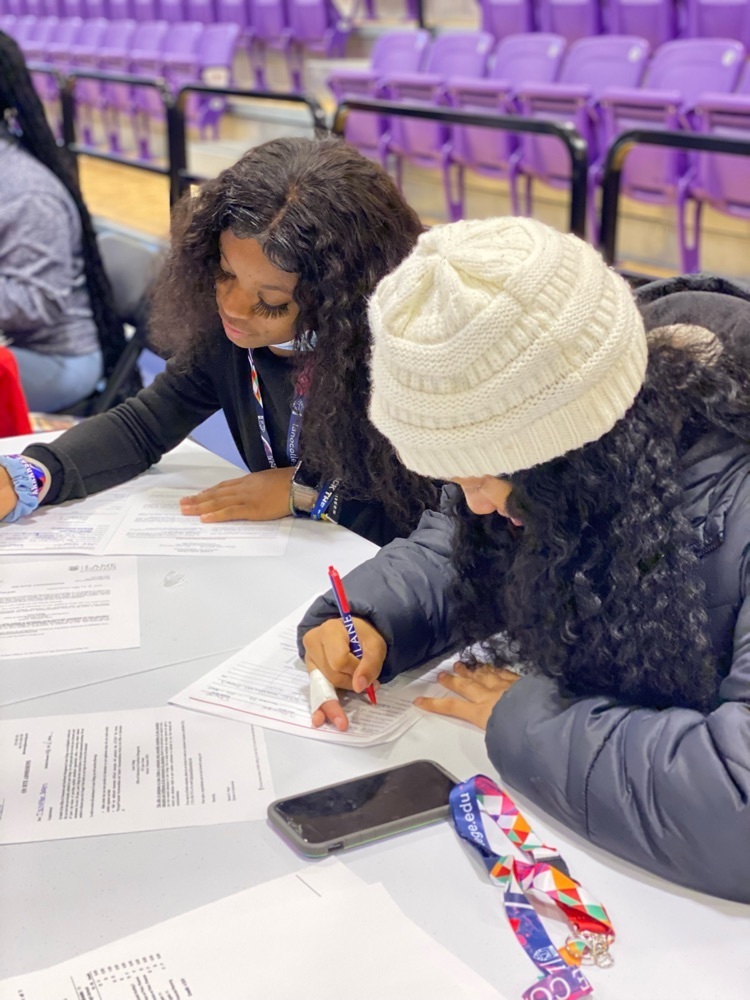 students filling out applications for college