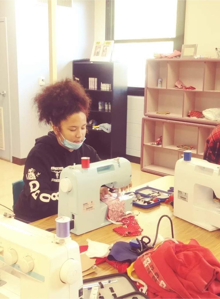 Choices student sewing during pullout class as part of theLife Skills Program.