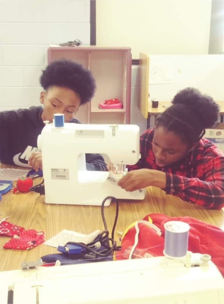 Choices student sewing during pullout class as part of theLife Skills Program.