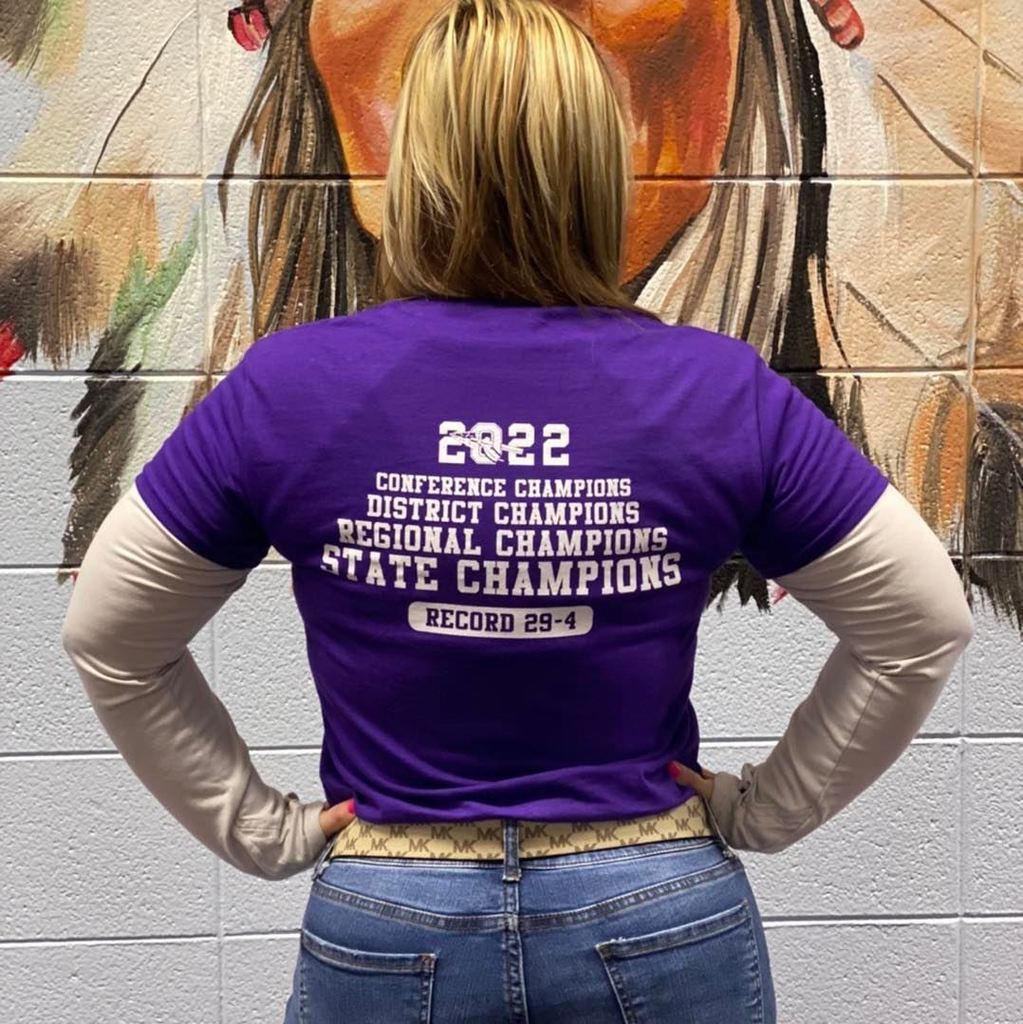 picture of woman in a purple shirt