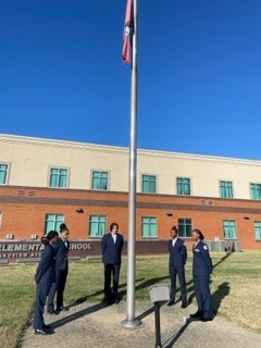 picture of cadets around flag pole