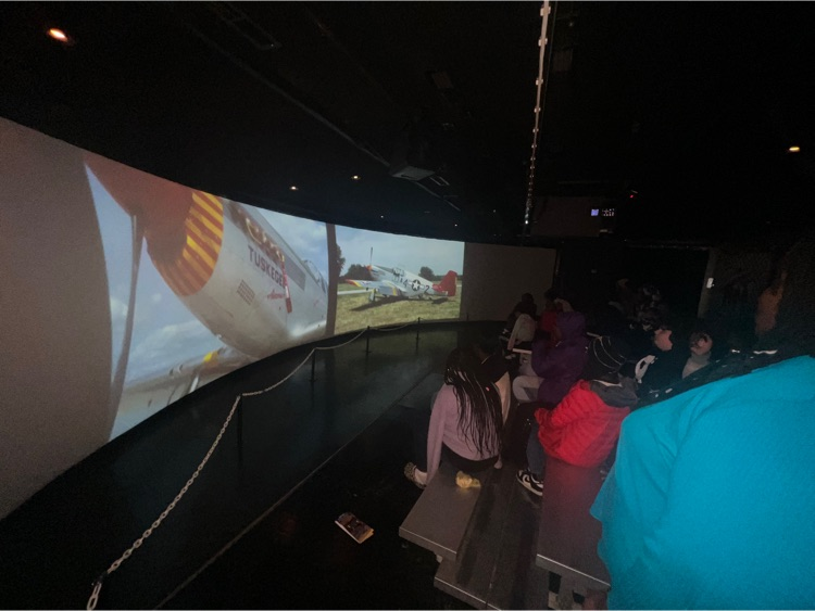 students watch Tuskegee presentation